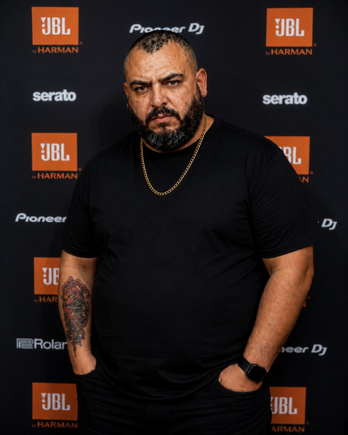Adam J. Colosimo at an industry event step-and-repeat, JBL, Pioneer DJ, Serato and Roland